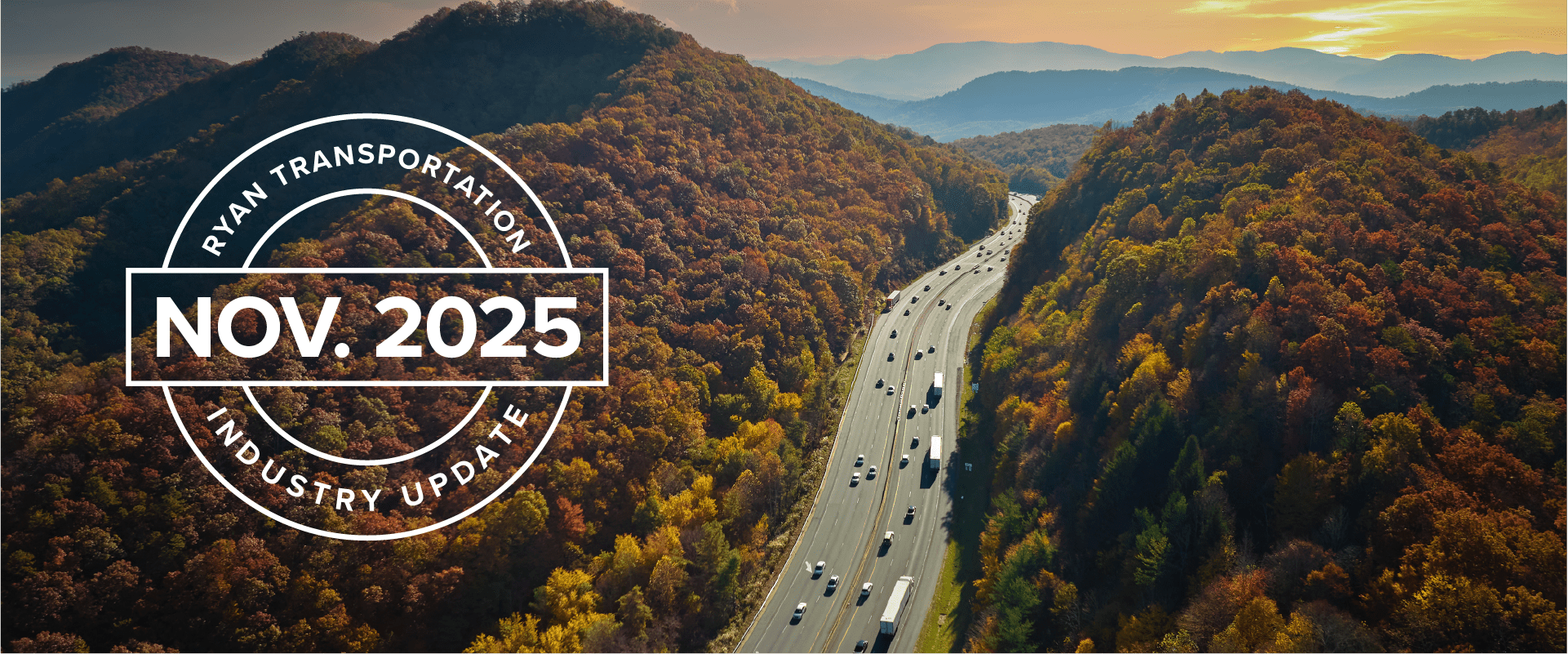 truck driving down fall road